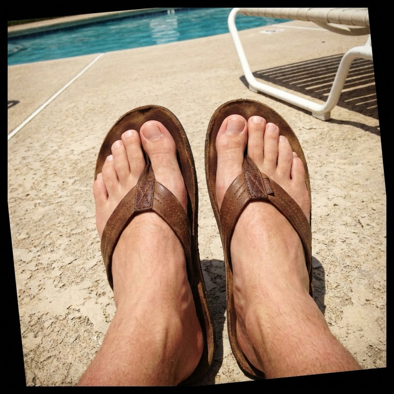 Customer wearing sandals at the pool again